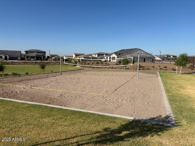 4041 S 176th Dr, Goodyear, AZ 85338 - view of home's community featuring volleyball court and a yard