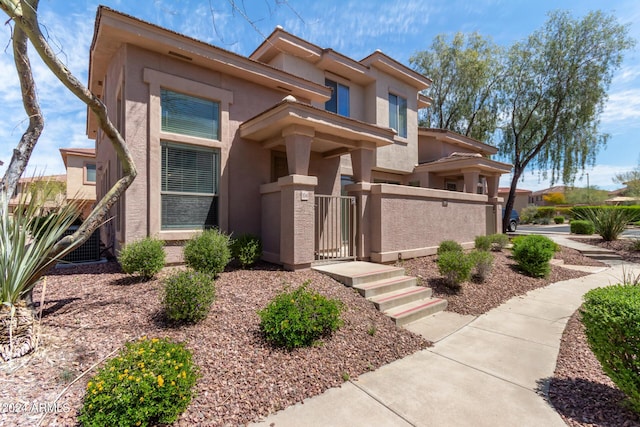 view of front of home with central AC