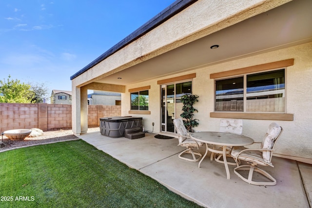 view of patio featuring fence