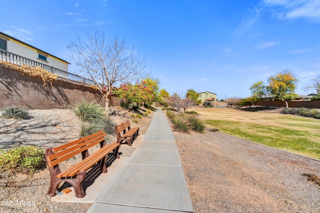 surrounding community featuring fence