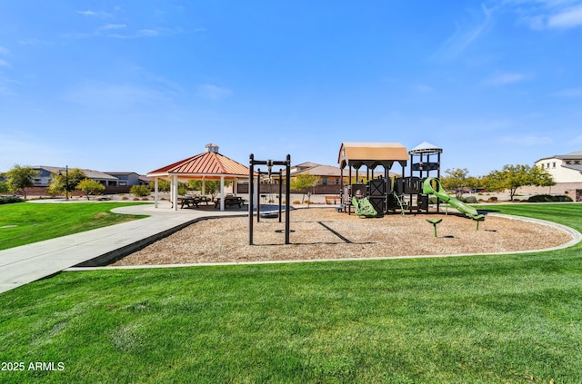 communal playground with a gazebo and a lawn