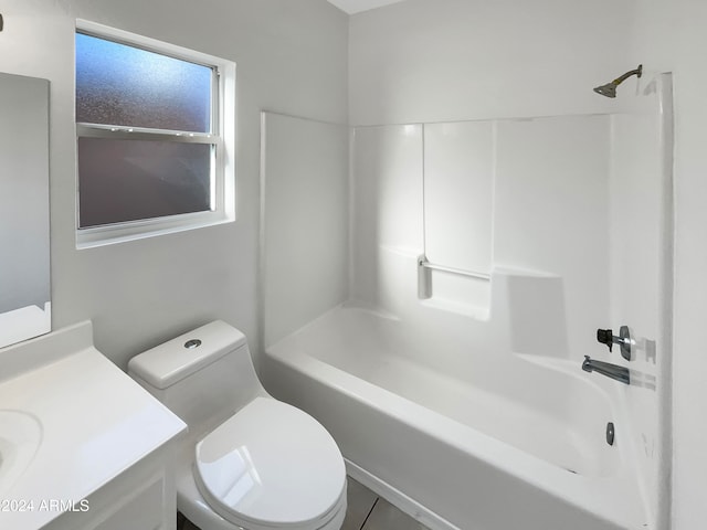 full bathroom featuring shower / tub combination, vanity, toilet, and tile patterned flooring