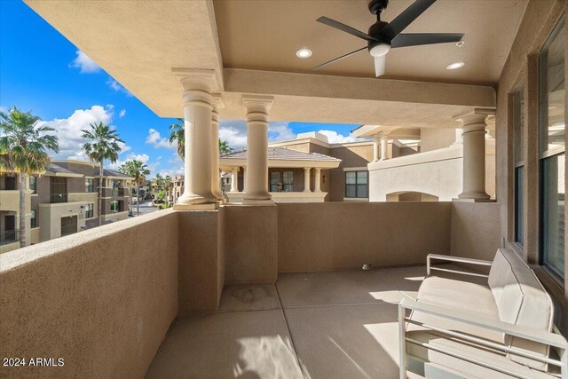 balcony featuring ceiling fan