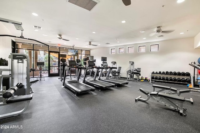 exercise room with ceiling fan