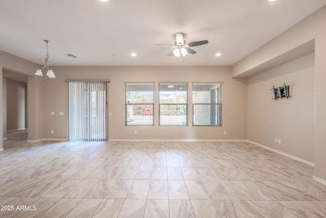 spare room featuring baseboards, a ceiling fan, and recessed lighting