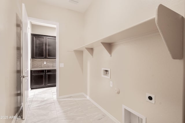 laundry room featuring gas dryer hookup, laundry area, washer hookup, marble finish floor, and electric dryer hookup