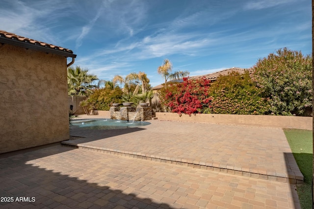 view of patio featuring a fenced in pool and a fenced backyard