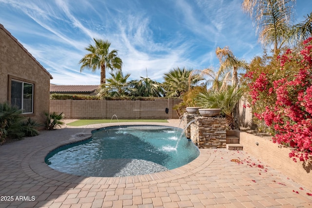 view of pool featuring a patio, a fenced backyard, and a fenced in pool