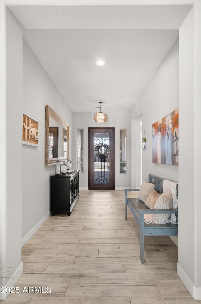 8149 E Jaeger St, Mesa, AZ 85207 - foyer featuring wood finished floors, baseboards, and recessed lighting