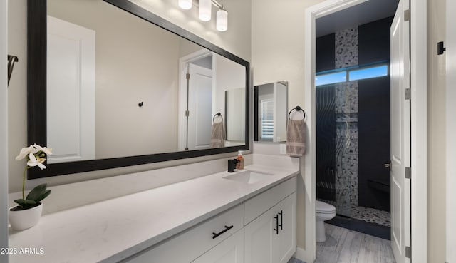 8149 E Jaeger St, Mesa, AZ 85207 - full bathroom featuring toilet, a shower stall, vanity, and wood finished floors