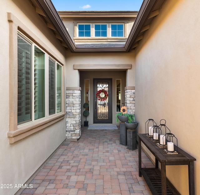 8149 E Jaeger St, Mesa, AZ 85207 - property entrance featuring stucco siding, stone siding, and a patio area