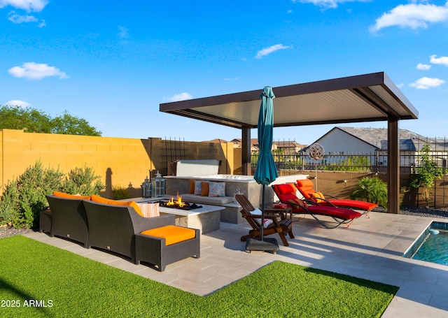 8149 E Jaeger St, Mesa, AZ 85207 - view of patio / terrace with a fire pit and a fenced backyard