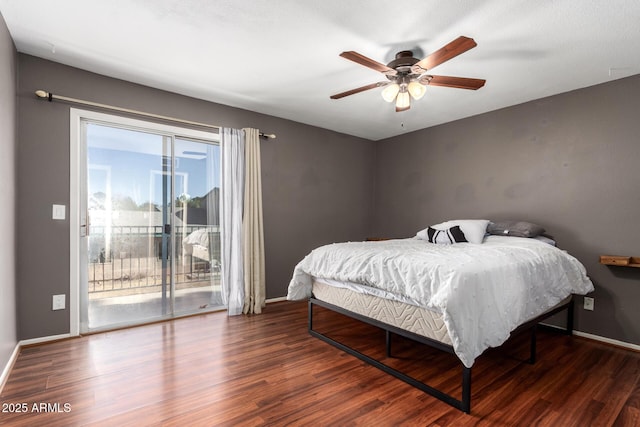 bedroom with dark hardwood / wood-style floors, access to exterior, and ceiling fan