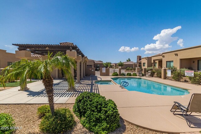 4241 N Pebblecreek Pkwy Unit 7, Goodyear, AZ 85395 - community pool featuring a pergola, a patio, and a community hot tub