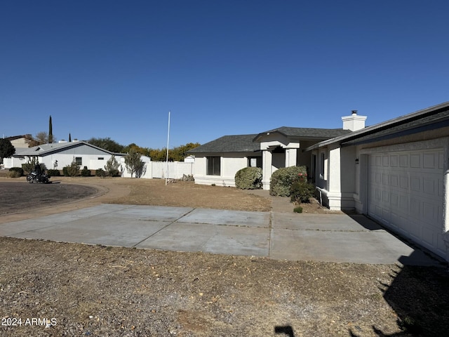 view of yard featuring a garage