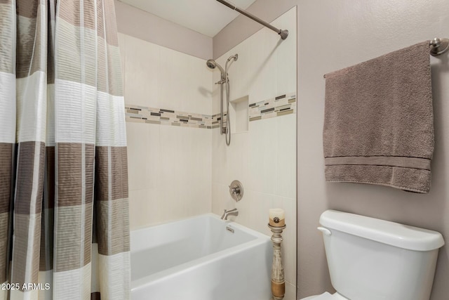 bathroom with shower / bathtub combination with curtain and toilet