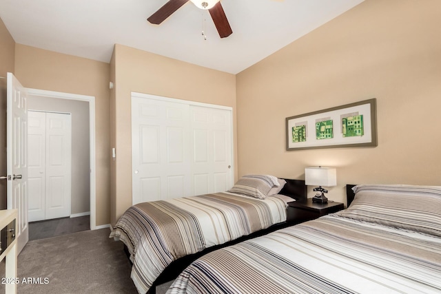 bedroom with carpet flooring, a ceiling fan, a closet, and baseboards