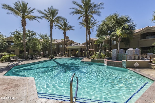 community pool with a patio