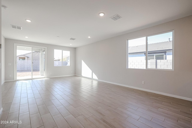 empty room with light wood-type flooring