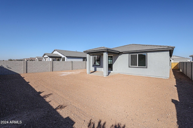 view of front of home featuring a patio