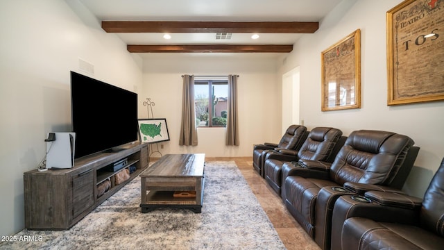 living room featuring beam ceiling