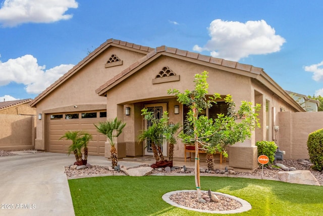 view of front of house featuring concrete driveway, an attached garage, fence, and a front lawn