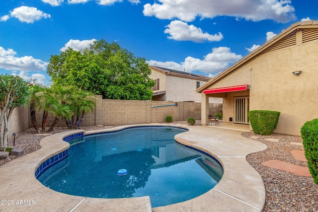 view of swimming pool with a patio, a fenced backyard, and a fenced in pool