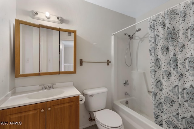 full bathroom with vanity, shower / tub combo, and toilet