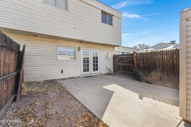 back of house with a patio and french doors