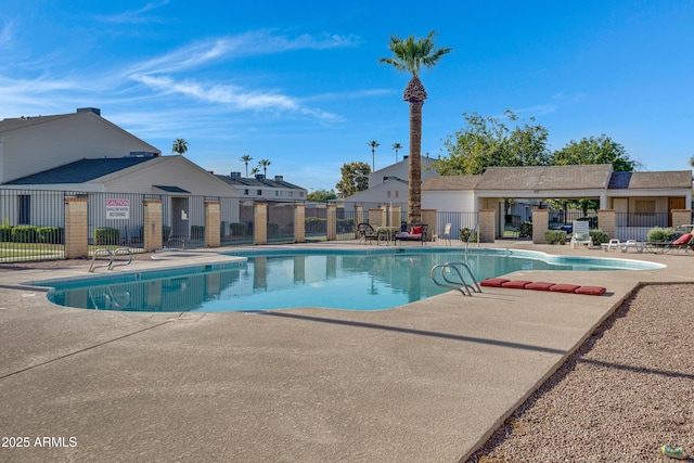 view of pool featuring a patio