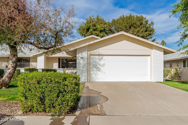 single story home featuring a garage