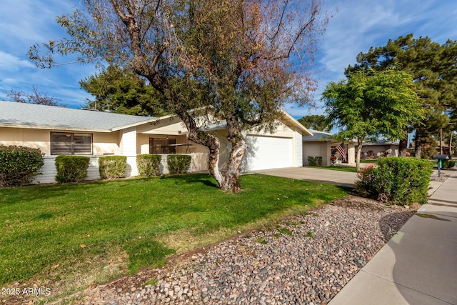 ranch-style house featuring a garage and a front yard