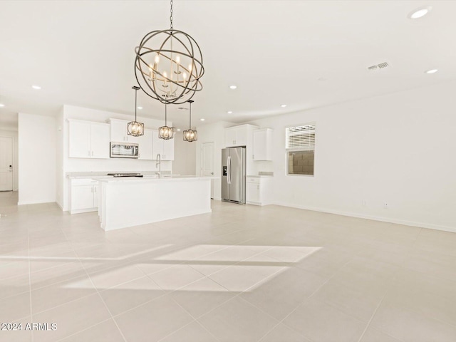 unfurnished living room featuring visible vents, recessed lighting, baseboards, and a sink