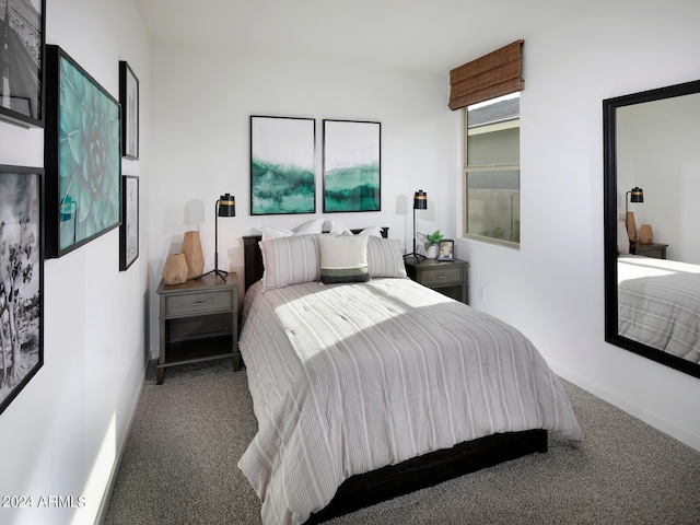 bedroom featuring baseboards and carpet floors