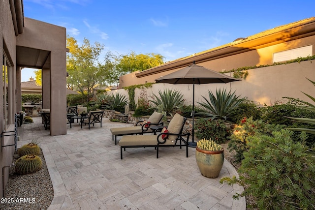 view of patio with a fenced backyard