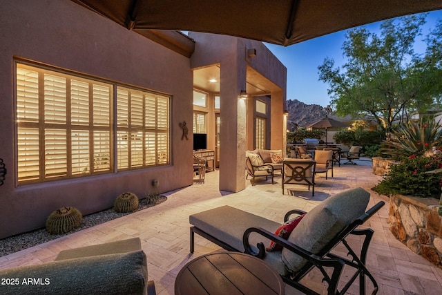 view of patio with outdoor dining space and an outdoor living space