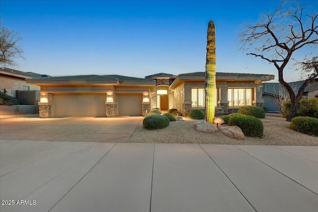 prairie-style house with a garage