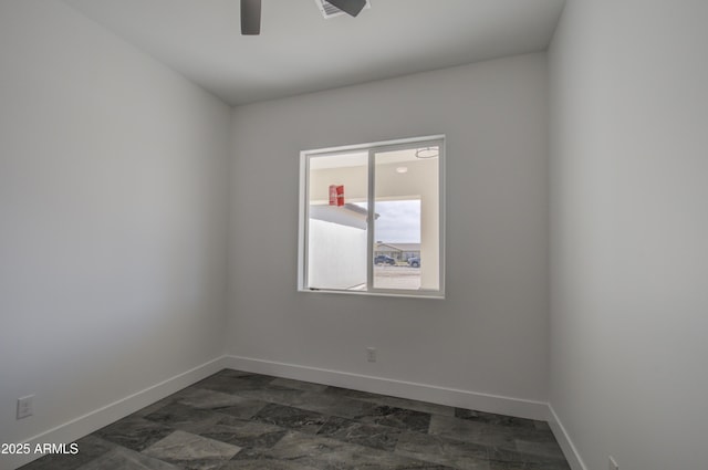 unfurnished room with ceiling fan