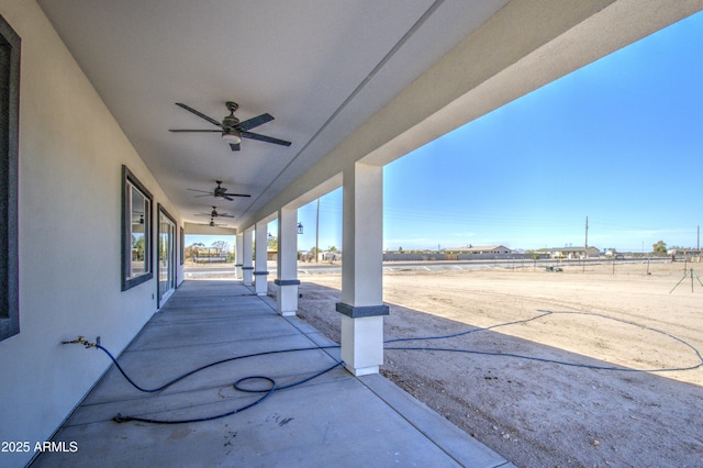 view of patio / terrace featuring ceiling fan