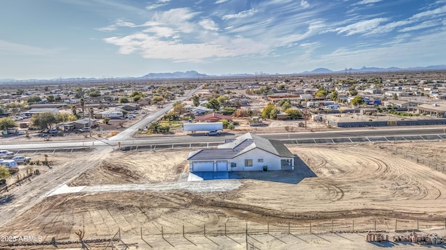 drone / aerial view featuring a mountain view