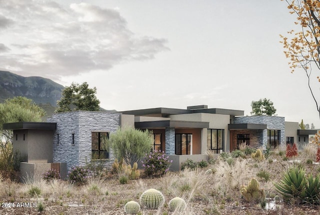 contemporary home featuring a mountain view