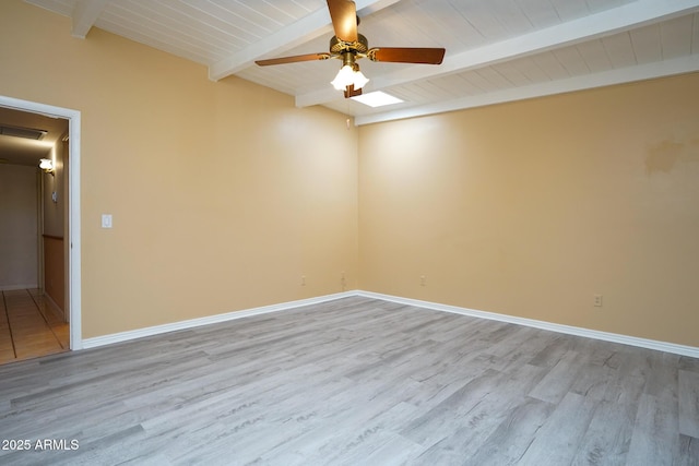 empty room featuring visible vents, baseboards, beam ceiling, light wood-style floors, and a ceiling fan