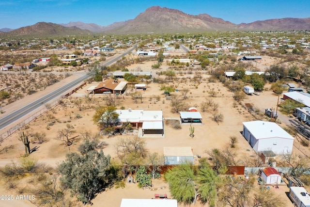bird's eye view featuring a mountain view and view of desert