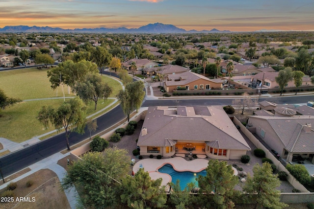 aerial view at dusk with a mountain view