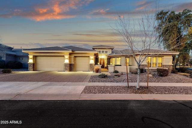 prairie-style house with a garage