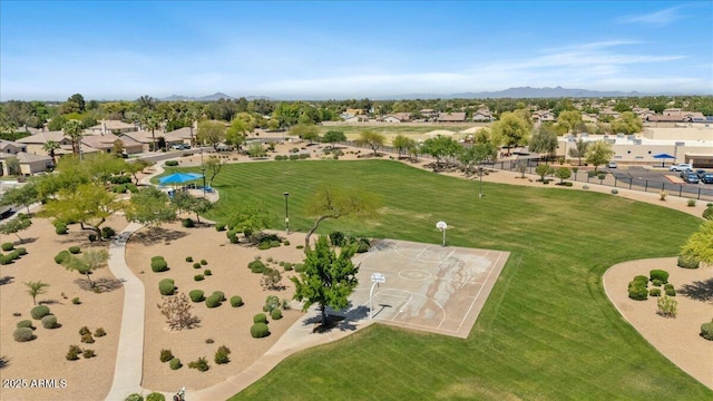 birds eye view of property with a residential view and a mountain view