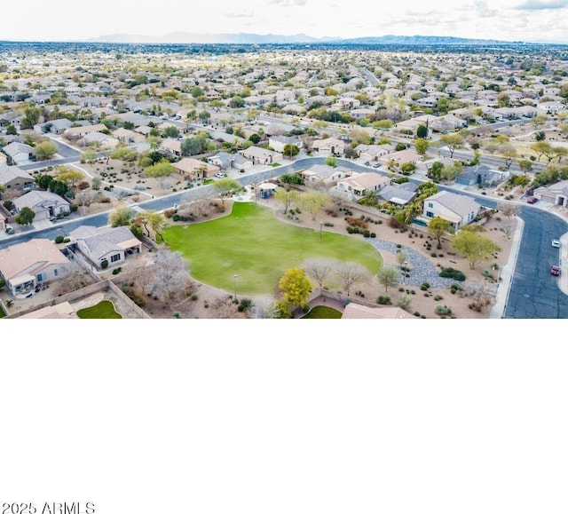 bird's eye view with a mountain view and a residential view