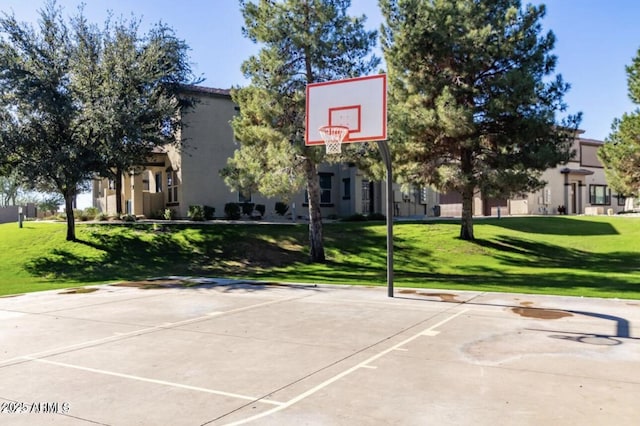14870 W Encanto Blvd Unit 1106, Goodyear, AZ 85395 - view of sport court featuring a lawn and community basketball court