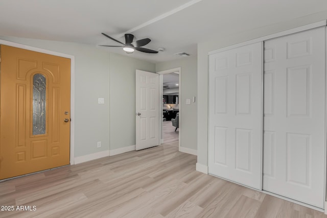 entrance foyer featuring ceiling fan and light hardwood / wood-style floors