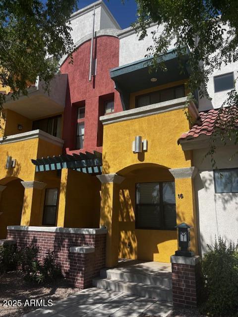 exterior space featuring stucco siding
